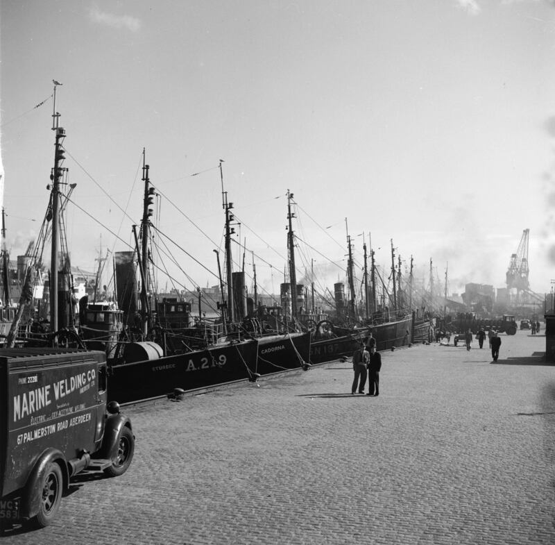 Fishing trawlers in Aberdeen Harbour in 1955. Getty Images