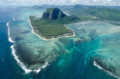 Aerial View Of Sea And Mountains, Petite Case Noyale, Mauritius. Getty Images