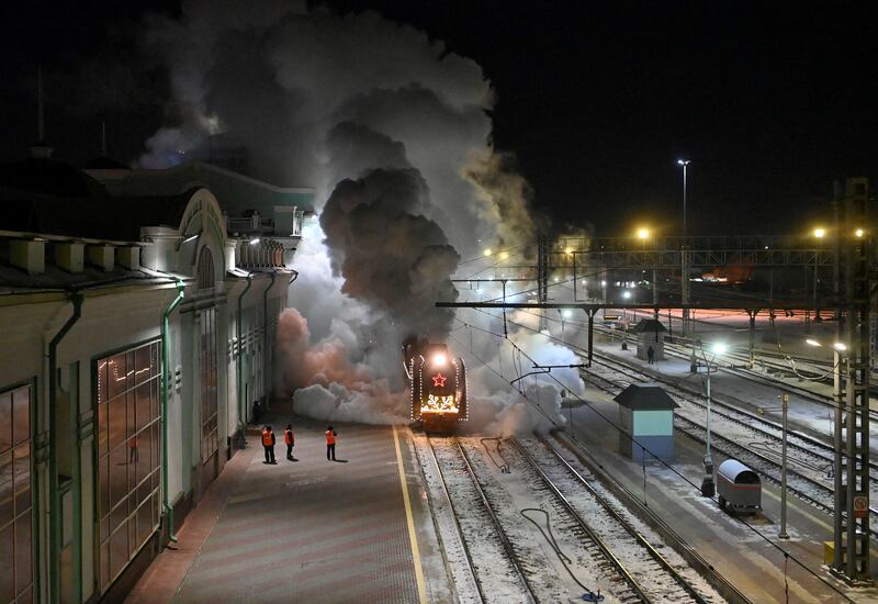Father Frost, the Russian equivalent of Santa Claus, and Snow Maiden arrive at a railway station in Omsk, Russia. Reuters