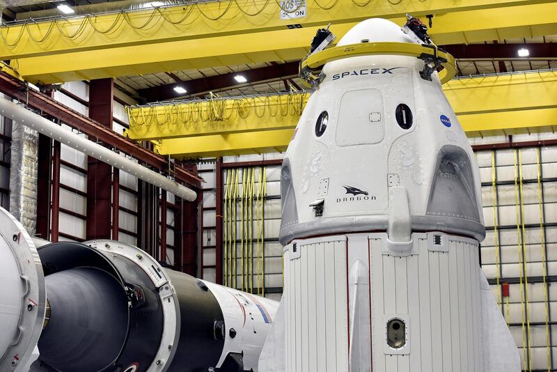 FILE PHOTO: The Dragon crew capsule sits in the SpaceX hangar at Launch Complex 39-A, where the space ship and Falcon 9 booster rocket are being prepared for a January 2019 launch at Cape Canaveral, Florida, U.S. December 18, 2018. REUTERS/Steve Nesius/File Photo