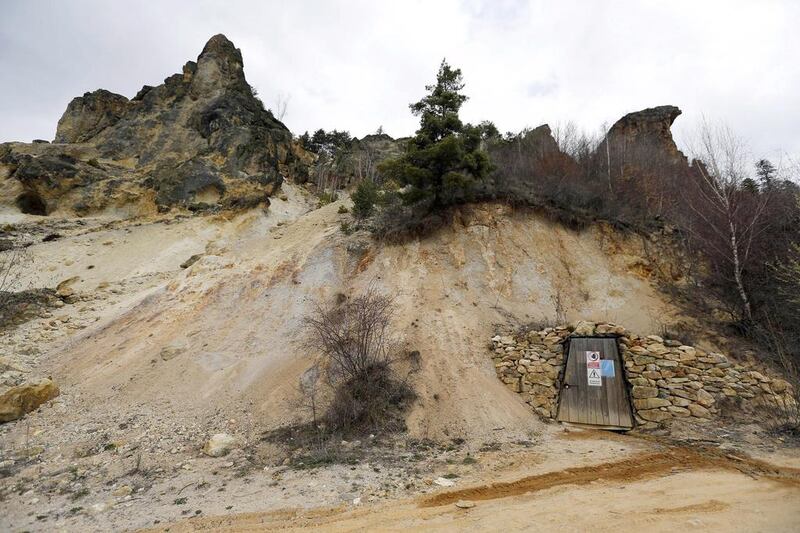 The entrance of a closed goldmine gallery is seen near Rosia Montana, central Romania. Bogdan Cristel / Reuters