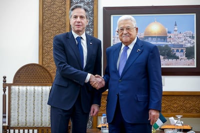 Palestinian President Mahmoud Abbas greets US Secretary of State Antony Blinken in Ramallah during his week-long trip aimed at calming tension across the Middle East in January. AP