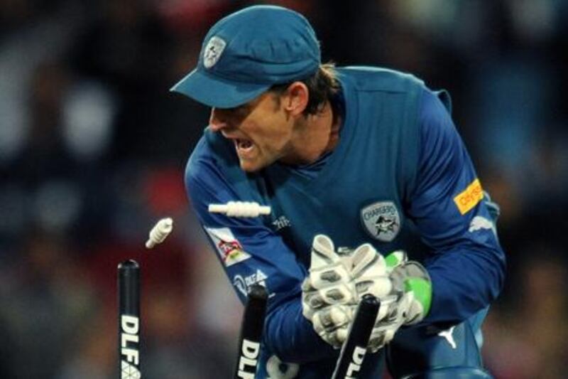 Adam Gilchrist behind the stumps for Deccan Chargers.