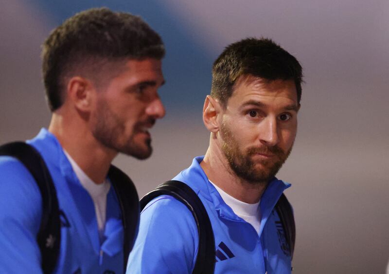 Argentina's Lionel Messi arrives in Doha alongside Rodrigo De Paul. Reuters