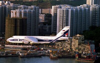 A Russian Antonov An-124, one of the world's largest aircraft, approaches Hong Kong's Kai Tak airport August 3, 1993. Reuters