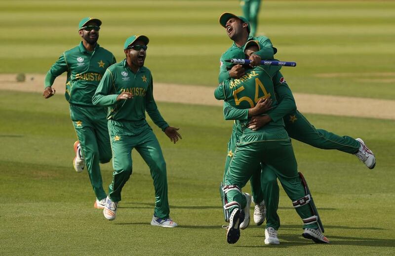 Pakistan's Sarfaraz Ahmed and teammates celebrate winning the Champions Trophy title at The Oval in London. Reuters