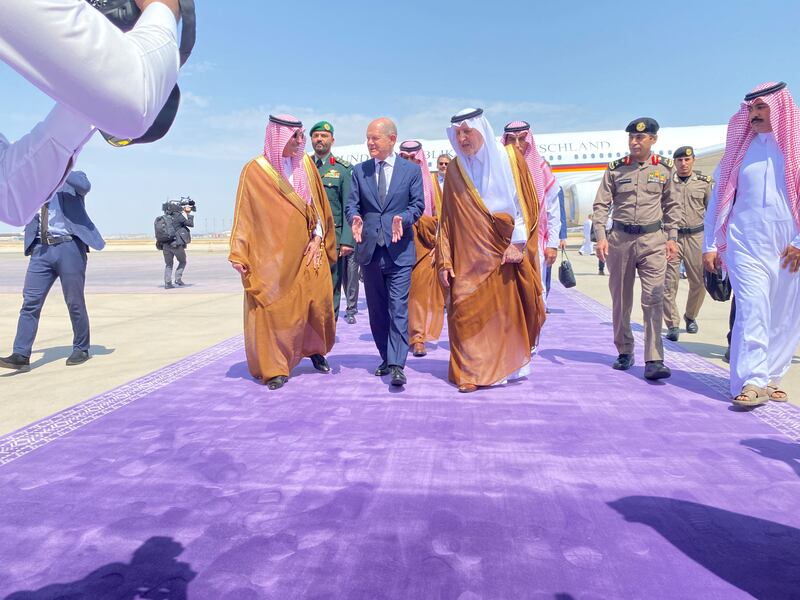 Prince Khalid bin Faisal, Governor of Makkah, receives German Chancellor Olaf Scholz at Jeddah Airport. US President Joe Biden and France's President Emmanuel Macron have also visited Saudi Arabia this year. Reuters