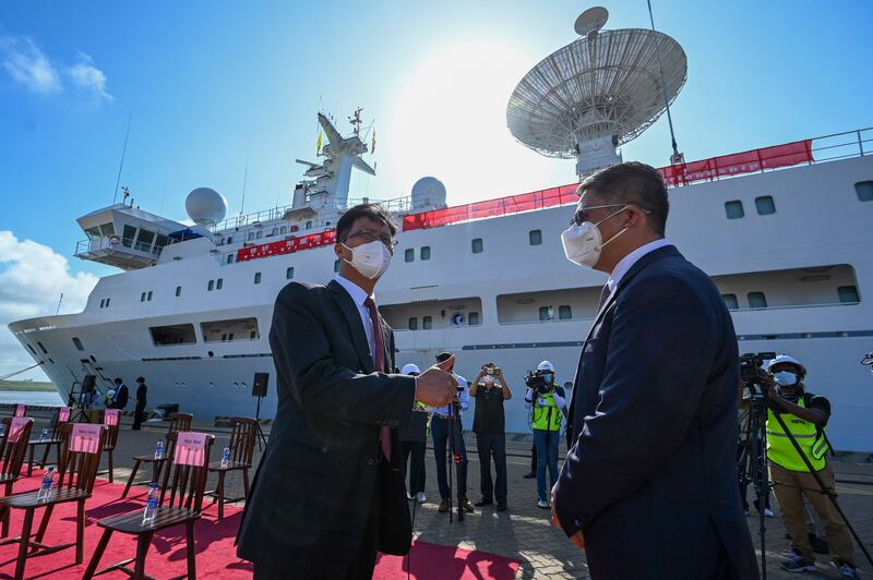 Qi Zhenhong, the Chinese ambassador to Sri Lanka, gestures upon the arrival of China's research and survey vessel at Hambantota this month. AFP