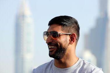 Amir Khan has always wanted to fight in Dubai and help grow boxing in the UAE. Chris Whiteoak / The National