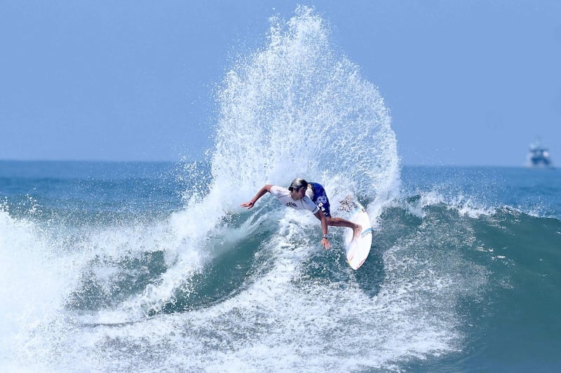 Japanese surfer Kanoa Igarashi rides a wave in the men's main round during the 2021 Isa World Surfing Games at El Tunco beach in El Salvador. AFP