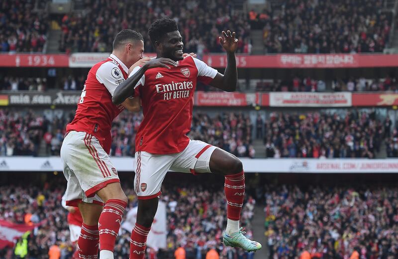 Thomas Partey (R) celebrates after scoring the fourth. EPA