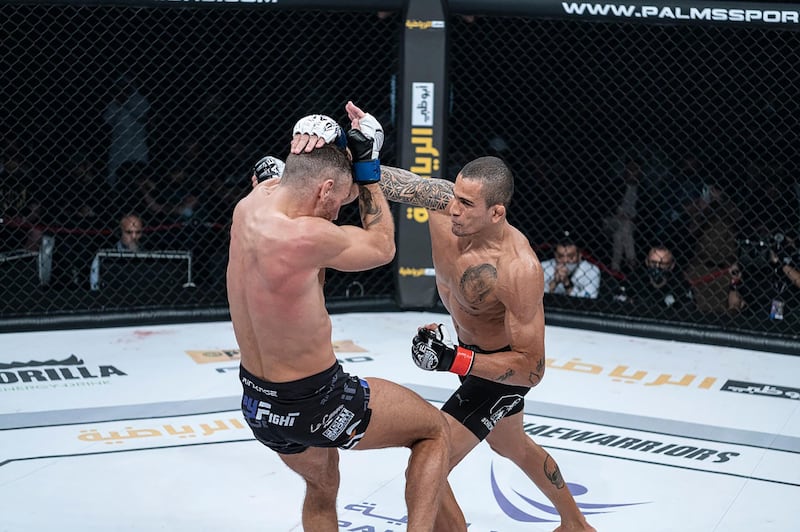 Bruno Machado lands one on Mickael Lebout in the Lightweight title fight at the UAE Warriors 15 on Friday, January 15, 2021. Courtesy UAE Warriors