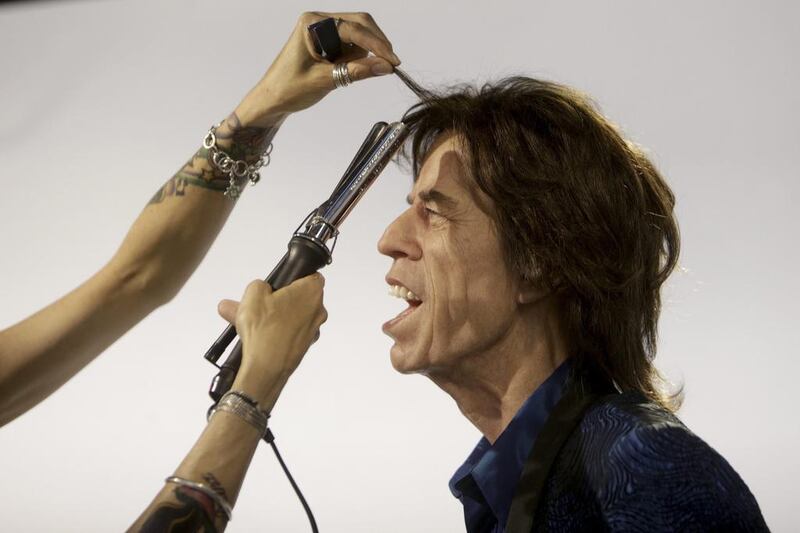 Hairdresser Virginie Dahan puts the final touches to Rolling Stones lead singer Mick Jagger’s statue at the Grevin Wax Museum in Prague on April 24, 2014. David W Cerny / Reuters 