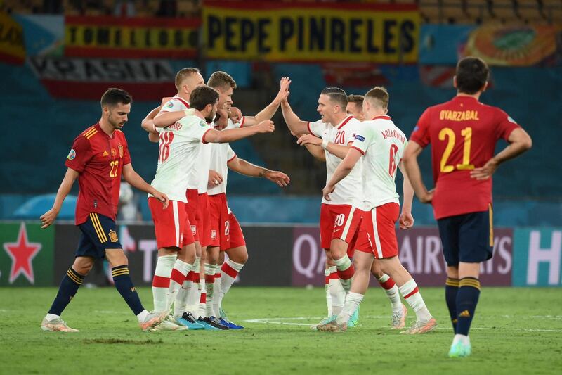 June 19, Group E: Spain 1-1 Poland. AFP