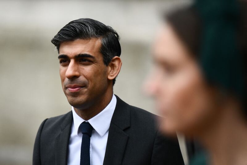 Britain's Chancellor Rishi Sunak suggested he had not ruled out a windfall tax on energy firm's profits. AFP