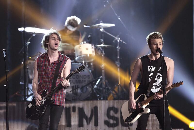 5 Seconds of Summer perform She Looks So Perfect onstage. Steve Marcus / Reuters