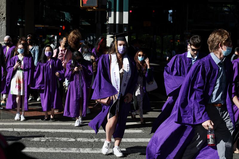 Students kept away from in-person ceremonies in 2020 and 2021 were given the opportunity to celebrate their accomplishments with friends. Reuters