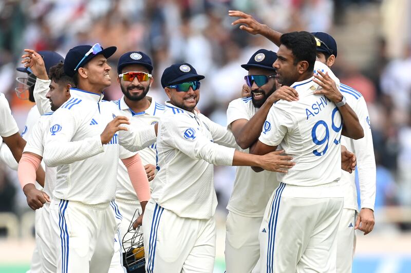 Ravichandran Ashwin celebrates with his India teammates after dismissing Joe Root for 11. Ashwin finished with second-innings figures of 5-51. Getty Images