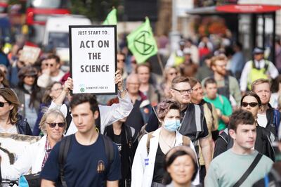 Protesters say the UK is doing too little to halt global warming. PA 
