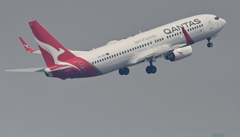A Qantas Boeing 737-800 takes off from Sydney's Kingsford Smith airport in Sydney on November 1, 2019. (Photo by PETER PARKS / AFP)
