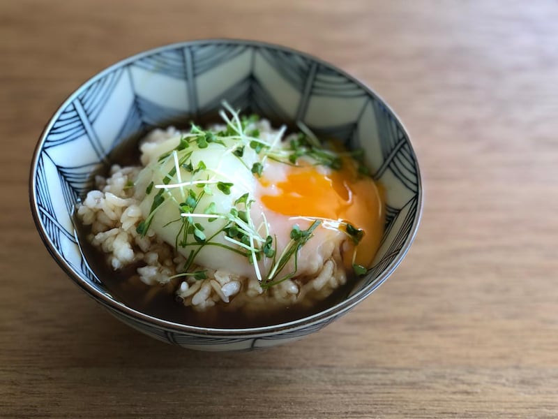 Onsen egg on rice with dashi.
