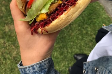 BurgerFuel’s V8 Vegan, featuring a patty made with pumpkin, carrot, and chickpeas and topped with vegan cheddar cheese, miso pea mash, vegan aioli, relish, and all the trimmings