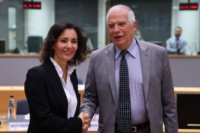Hadja Lahbib is greeted by chief EU diplomat Josep Borrell at her first meeting of the bloc's foreign ministers in Brussels. AFP 