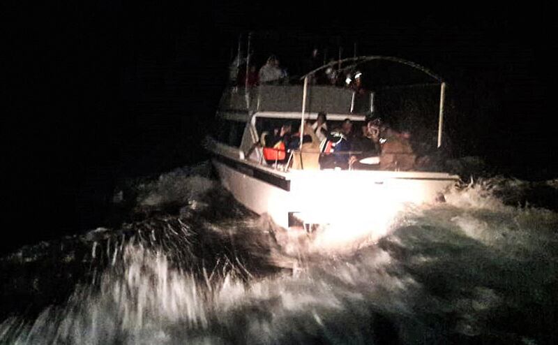 A handout photo provided by the Lebanese Army website reportedly shows survivors of a capsized boat on board an army boat after they were rescued off the coast of the northern Lebanese city of Tripoli. AFP