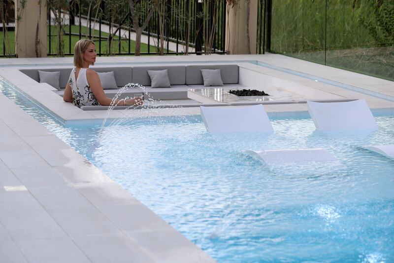 Sarah and Antony De Fonseka's back garden pool is also temperature controlled and chemical free