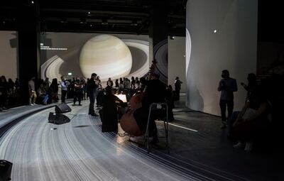 On the opening night of Destination Cosmos: The Ultimate Challenge  at Infinity des Lumieres, visitors were treated to music by a live chamber orchestra. Ruel Pableo for The National