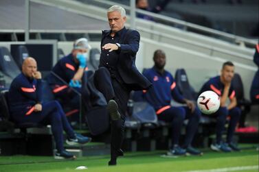 Tottenham Hotspur's Portuguese head coach Jose Mourinho kicks the ball back into play during the English Premier League football match between Tottenham Hotspur and Everton at Tottenham Hotspur Stadium in London, on September 13, 2020. - RESTRICTED TO EDITORIAL USE. No use with unauthorized audio, video, data, fixture lists, club/league logos or 'live' services. Online in-match use limited to 120 images. An additional 40 images may be used in extra time. No video emulation. Social media in-match use limited to 120 images. An additional 40 images may be used in extra time. No use in betting publications, games or single club/league/player publications. / AFP / POOL / Adam Davy / RESTRICTED TO EDITORIAL USE. No use with unauthorized audio, video, data, fixture lists, club/league logos or 'live' services. Online in-match use limited to 120 images. An additional 40 images may be used in extra time. No video emulation. Social media in-match use limited to 120 images. An additional 40 images may be used in extra time. No use in betting publications, games or single club/league/player publications.