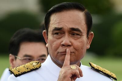 Thailand's Prime Minister Prayut Chan-O-Cha gestures as he arrives at Government House in Bangkok in 2019. AFP