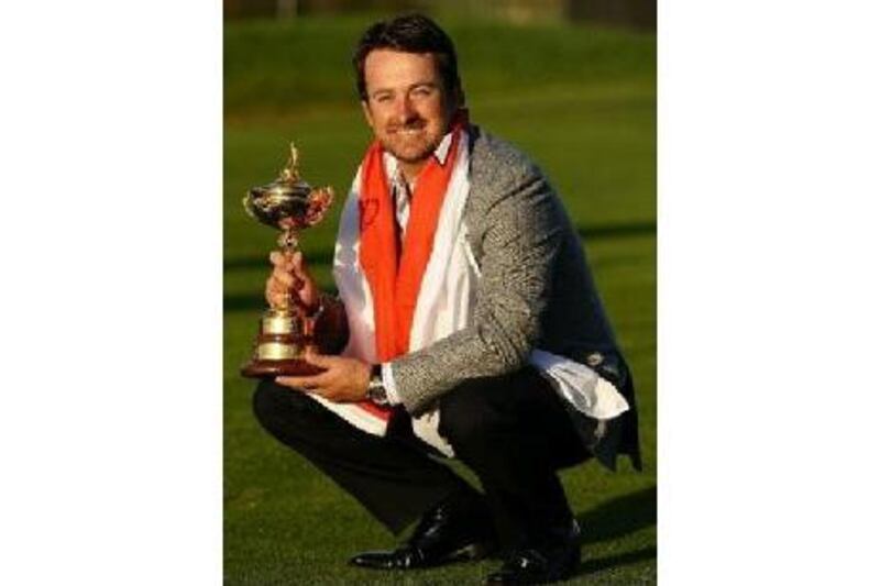 Graeme McDowell with the Ryder Cup after his match-winning round in Newport, Wales, on Monday. Timothy A Clary / AFP PHOTO