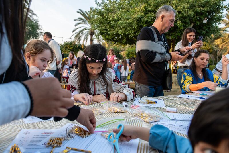 Families participated in various traditional workshops during the festive event.