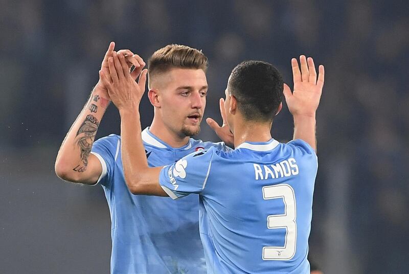 Lazio's Sergej Milinkovic-Savic celebrates scoring their second goal with Luiz Felipe. Reuters