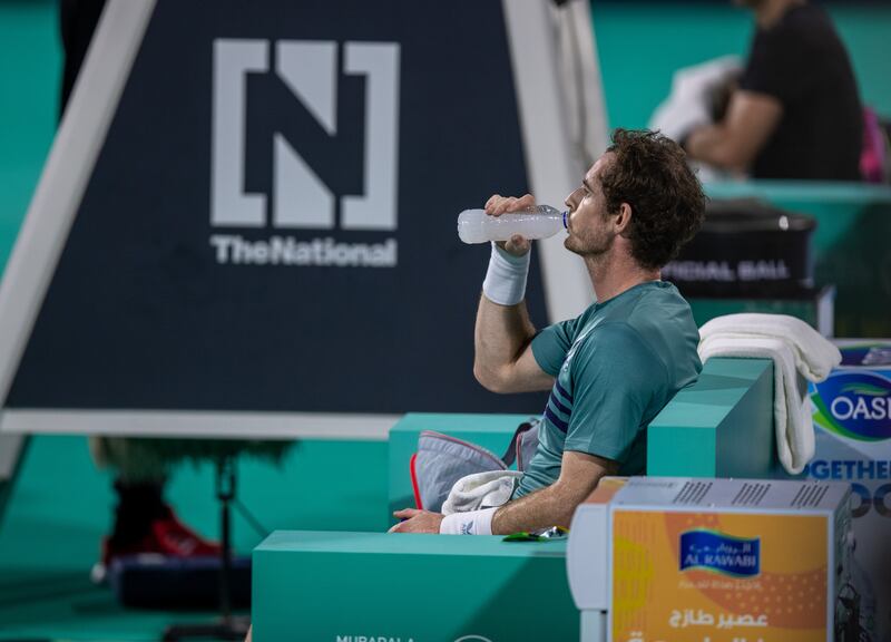 Andy Murray hydrates in between sets during his match with Rafael Nadal at the Mubadala World Tennis Championship. Victor Besa / The National