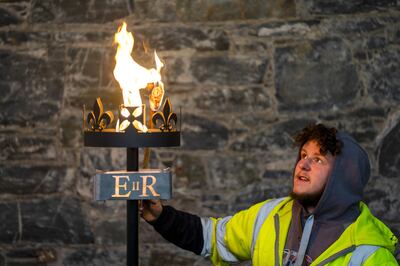Lewis Wilde tests of one of the gas-fuelled beacons he has made which will be used to signal the start of Queen Elizabeth II's Platinum Jubilee in June, at the Fountain Designs workshop in Selkirk, in the Scottish Borders. PA