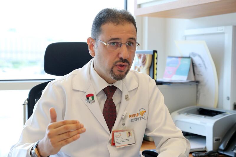 DUBAI, UNITED ARAB EMIRATES , September 16 – 2020 :- Dr. Adel Mohamed Yasin Alsisi, Consultant Critical Care speaking about the Flu vaccine at the Prime Hospital in Dubai.  (Pawan Singh / The National) For News/Online. Story by Nick Webster