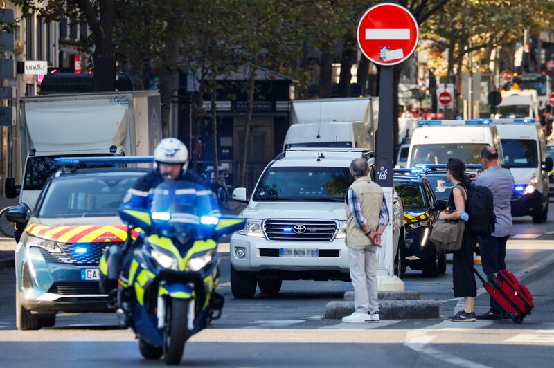 French Gendarmes escort a convoy understood to be transporting Abdeslam. AFP