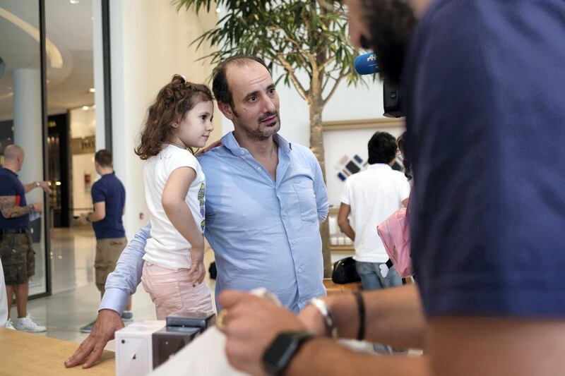 23.09.17. iPhone 8 launch in Dubai Mall Saturday morning. People has waited in line since early morning and others has pre ordered a phone online. Ibrahim Al Shamsi from Al Ain was the first person to receive the iPhone after having pre ordered 9 online. He was let into the apple store at 9 with his family as one of the first people.

Anna Nielsen For The National.