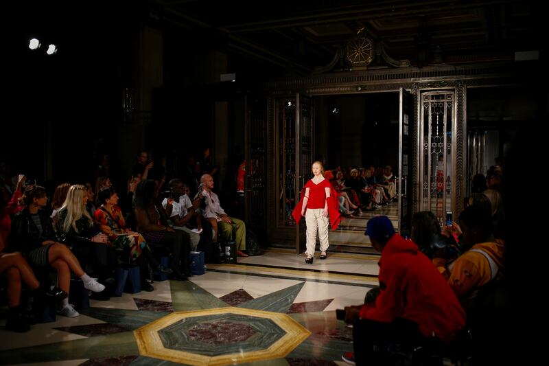 Model Madeline Stuart on the catwalk at the Swedish School of Textiles in London. Reuters