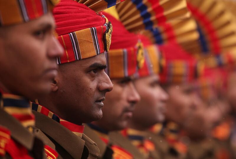 Policemen take part in a full dress rehearsal for Republic Day parade in Srinagar. Reuters