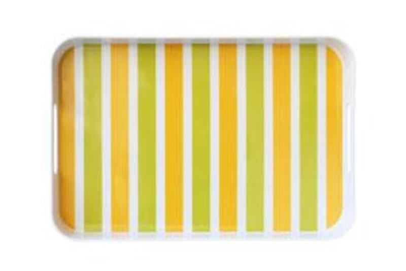 Jonathan Adler's Acapulco and stripes collections feature melamine tableware in bold patterns.