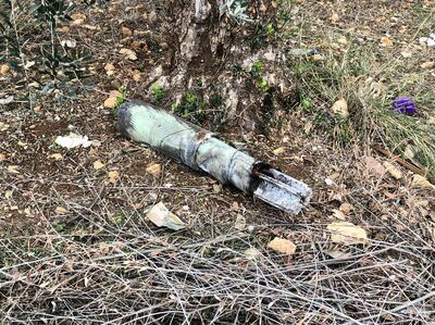 A white phosphorus shell in a garden in Dhayra. Nada Atallah / The National