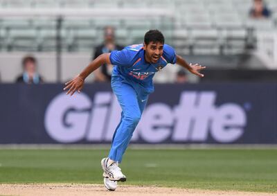 India's Bhuvneshwar Kumar celebrates the wicket of Australia's Aaron Finch during their one day international cricket match in Melbourne, Australia, Friday, Jan. 18, 2019. (AP Photo/Mal Fairclough)