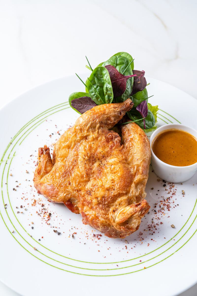 Baby chicken with tandoori sauce from the main course selection at the French restaurant mixes things up a little.