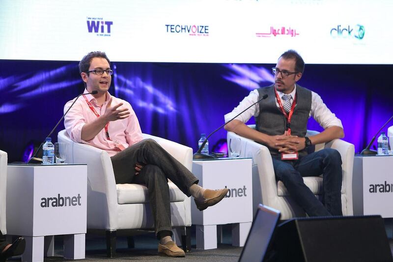 David El Achkar, left and Tarik Kaddoumi during the panel discussion on Bitcoins at the ArabNet Digital Summit in Dubai. Pawan Singh / The National