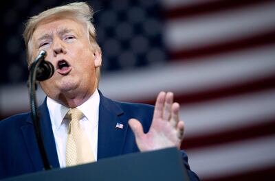 (FILES) In this file photo taken on October 11, 2019 US President Donald Trump gestures as he speaks during a "Keep America Great" rally at Sudduth Coliseum at the Lake Charles Civic Center in Lake Charles, Louisiana. President Donald Trump urged Mexico on November 5, 2019 to "wage war," with US help, on the drug cartels believed to have ambushed a group of American Mormons in northern Mexico, killing nine women and children."If Mexico needs or requests help in cleaning out these monsters, the United States stands ready, willing & able to get involved and do the job quickly and effectively," Trump wrote in a tweet.
 / AFP / SAUL LOEB
