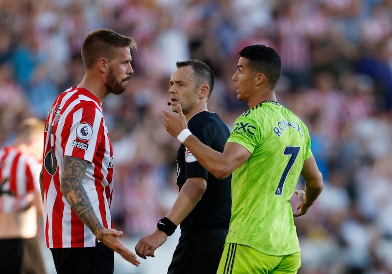 Brentford's Pontus Jansson clashes with Cristiano Ronaldo. Action Images