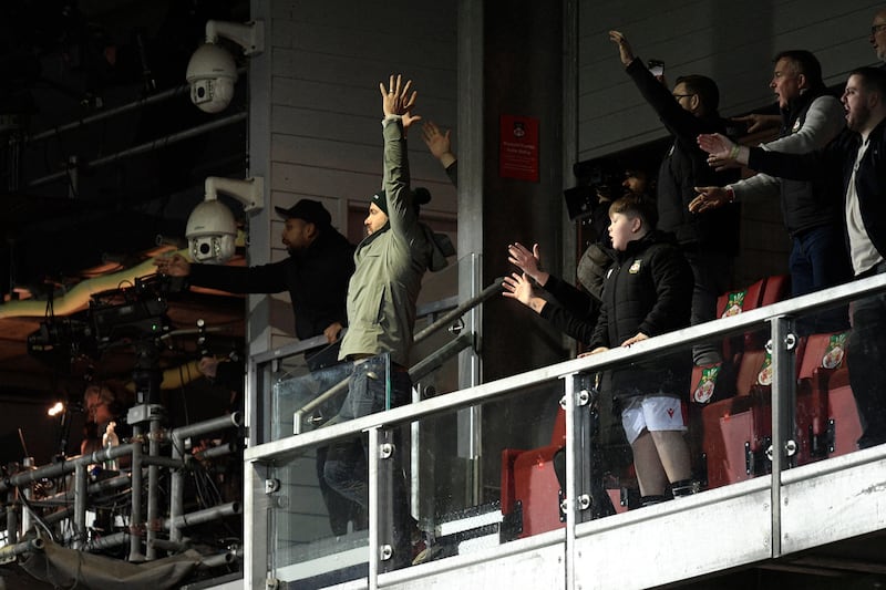 Ryan Reynolds celebrates a Wrexham goal. AFP